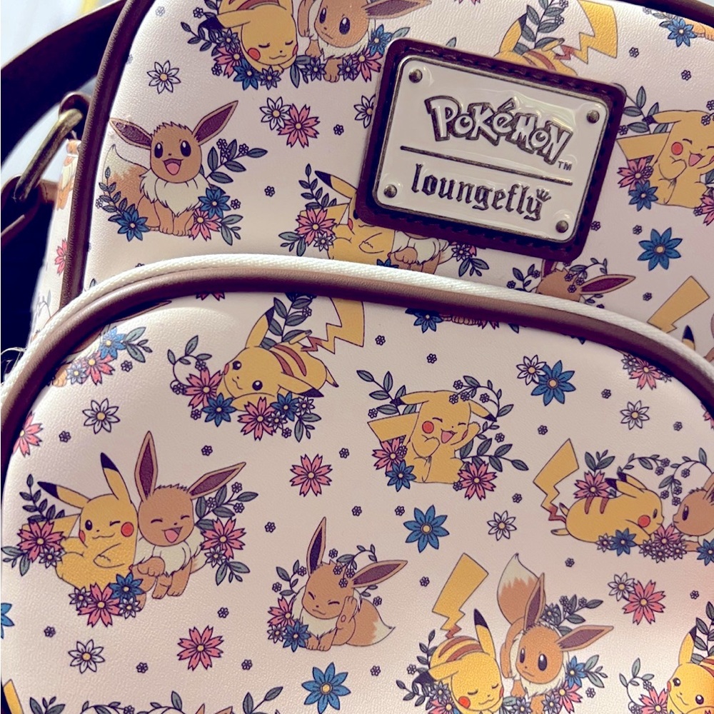 Pikachu & Eevee Loungfly crossbody purse.